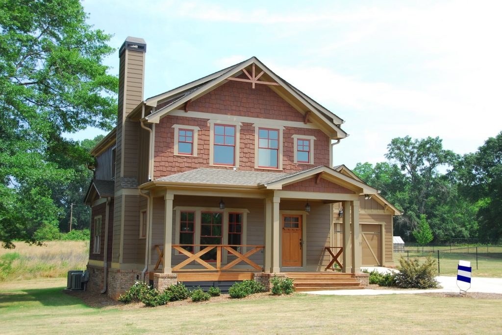 Craftsman style home with chimney