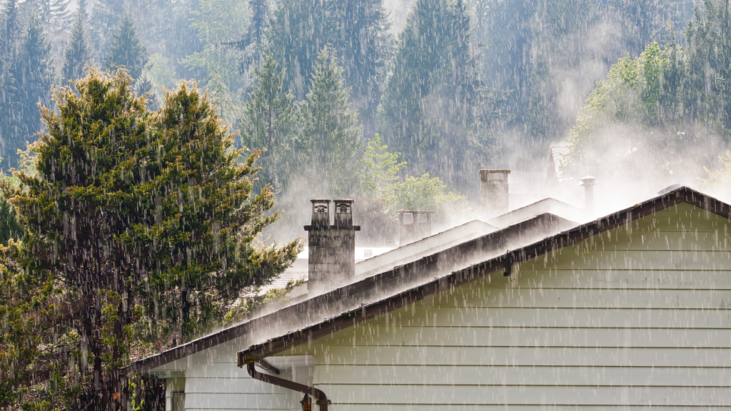 Hard rain on a home's roof and chimney